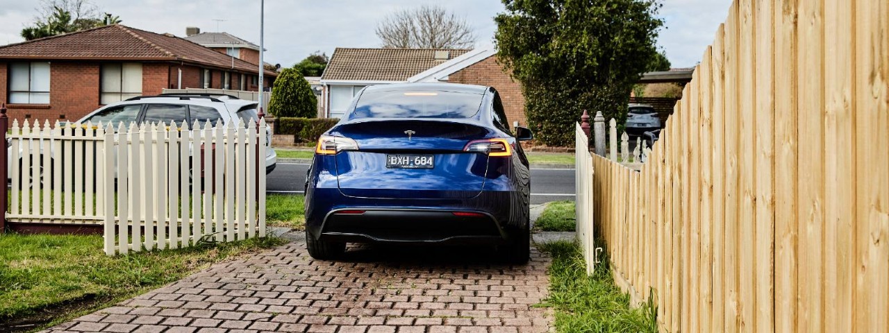 Tesla EV in home driveway