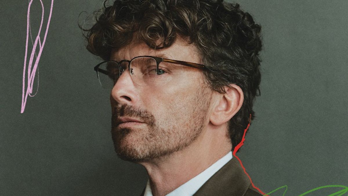 man wearing glasses looking at the camera