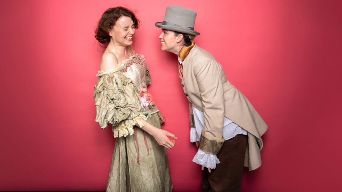 two people in regency-era costume