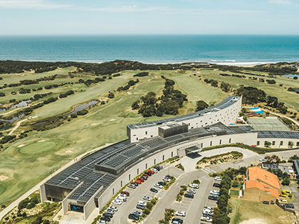 Aerial view of solar panels installed on a building. 