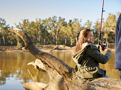 Child fishing in the Murray River near Cobram Resort.