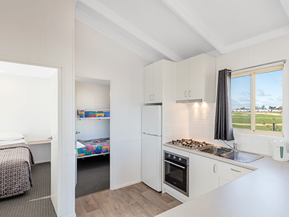 Kitchen area of park cabin in Cobram Resort.