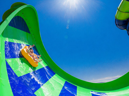 A large green and blue slide at Funfields