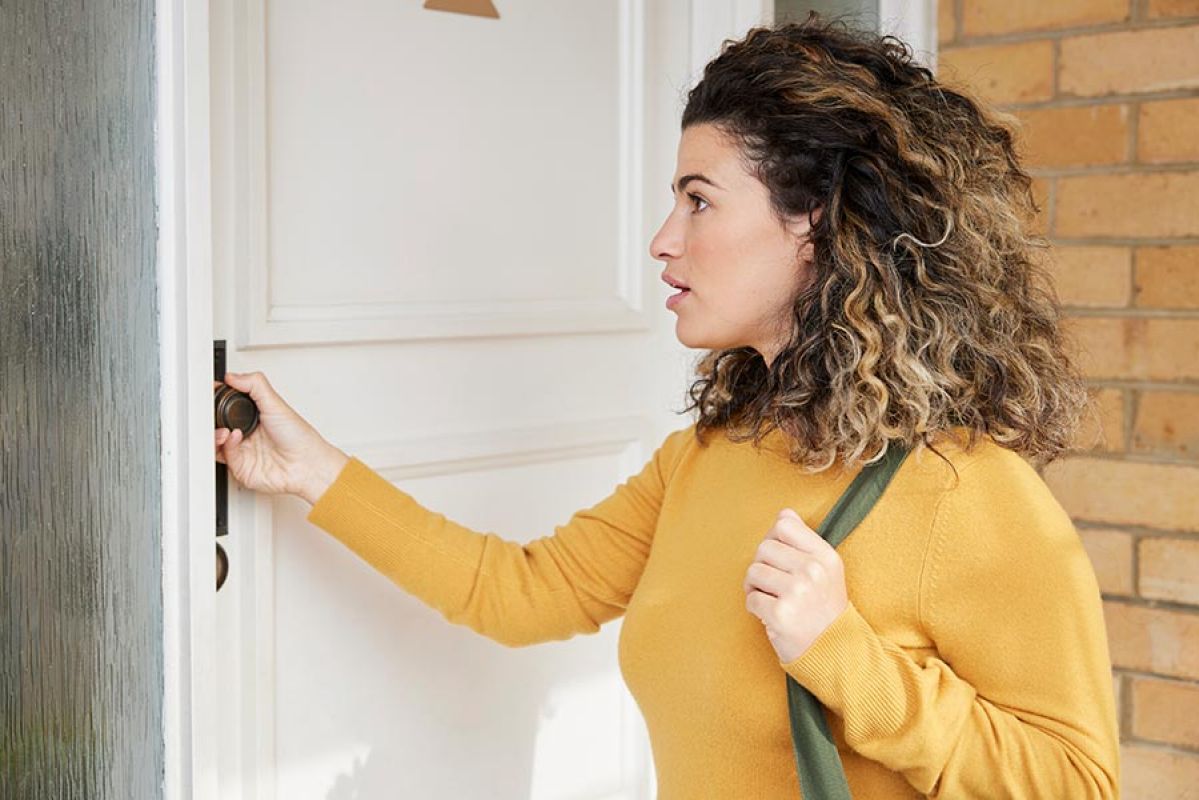 Woman locked out of house at front door