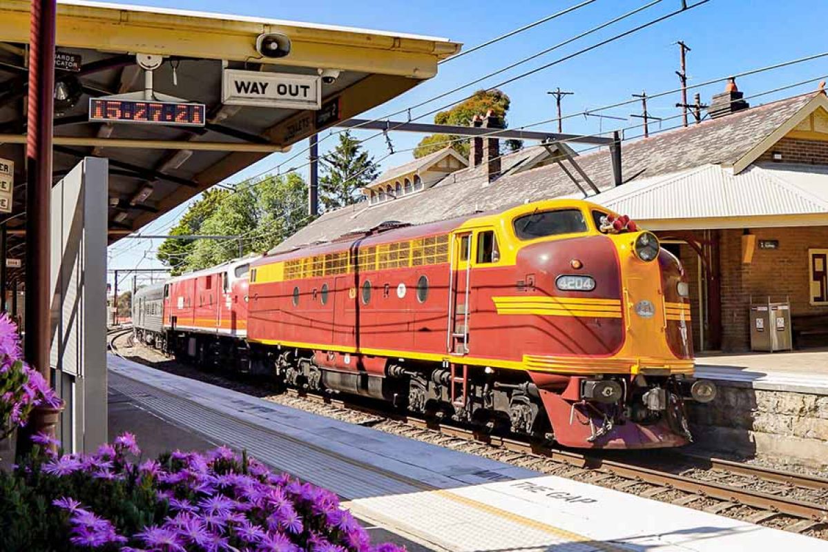 aerial view of the Arc de Triomphe surrounded by streets and buildings