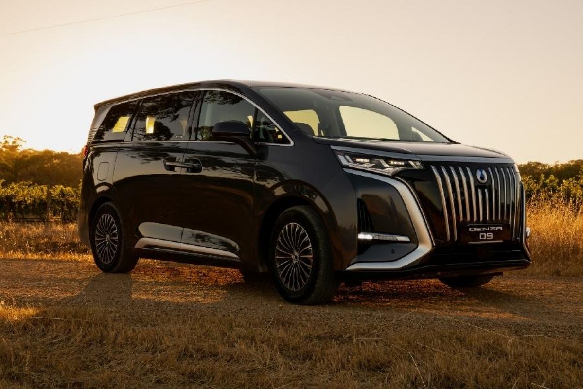 The Denza D9 at sunset