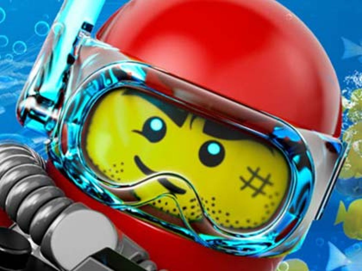 Close up of a Lego toy with fish swimming behind him.