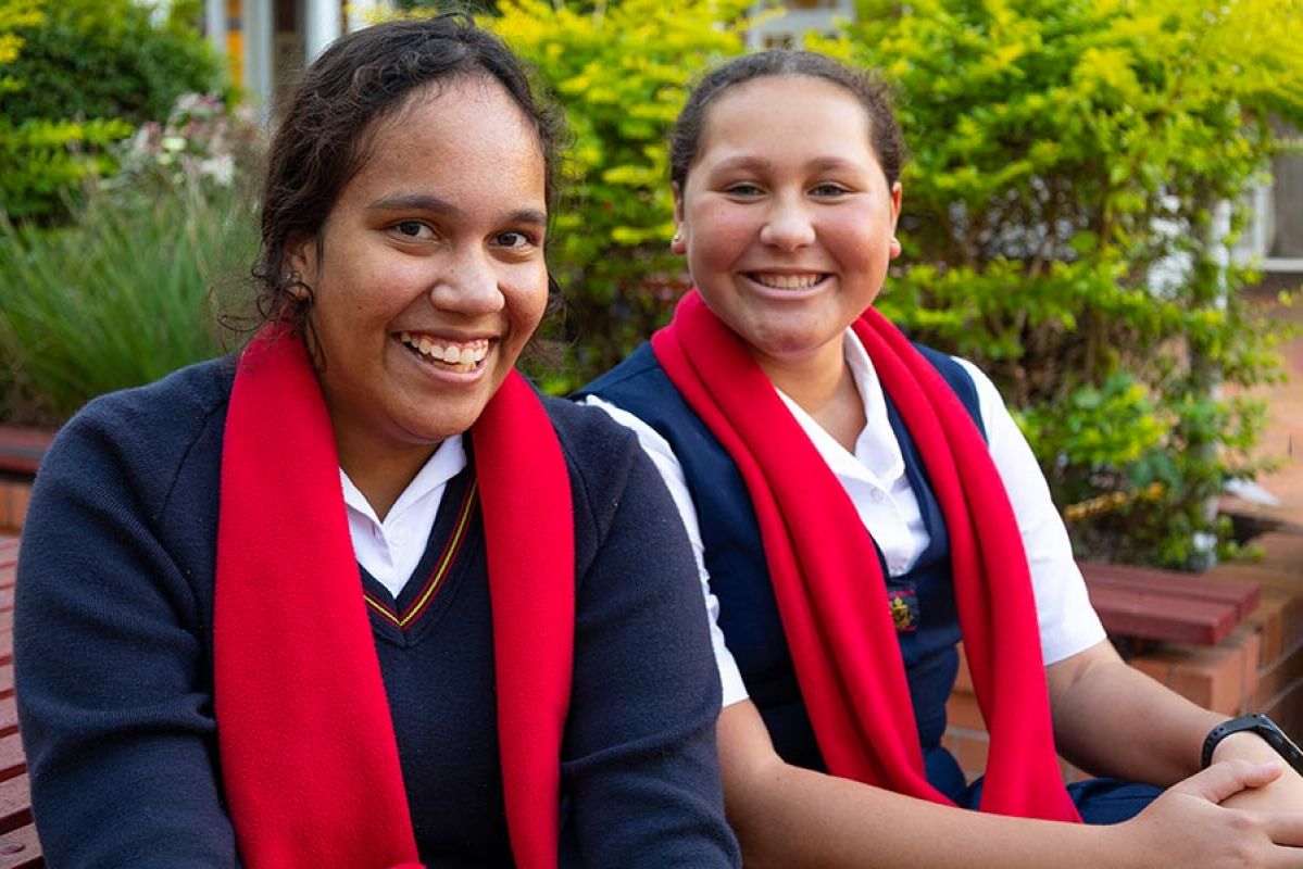 Two young Indigenous boys smiling