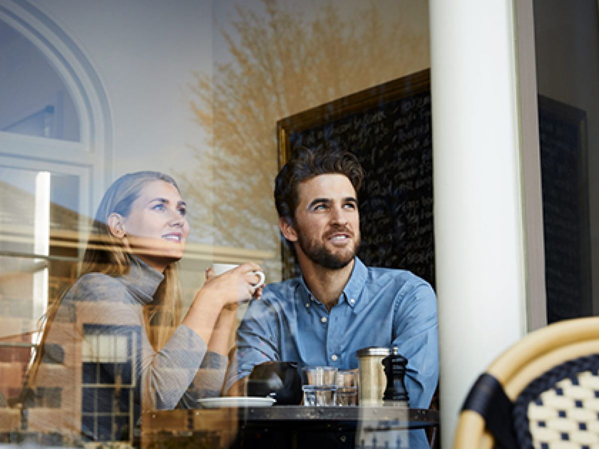 Couple having coffee at a local cafe in Hobart.