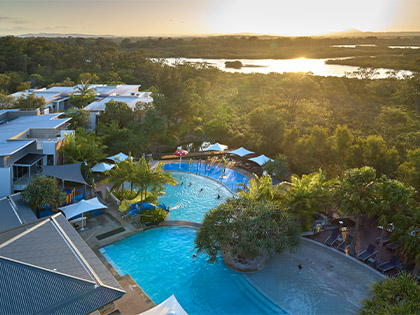 Aerial shot of the Noosa Resort pools and surrounding greenery.