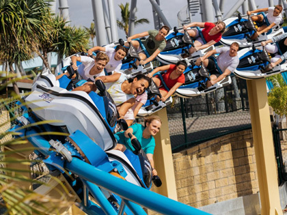 Guests riding a roller coaster at Sea World