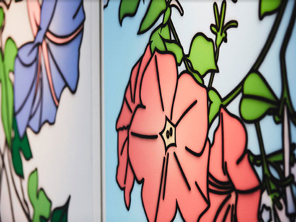 Artwork on canvas depicting flowers and leaves.