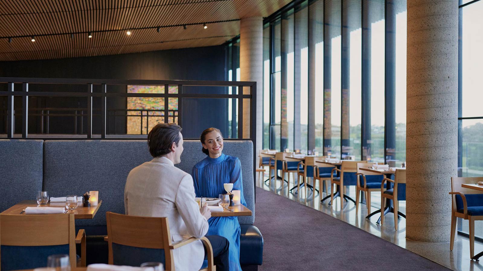 Couple sharing a meal at Number One restaurant at RACV Torquay Resort.