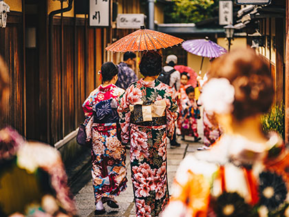 Women in traditional japanese kimonos walking in Kyoto, Japan